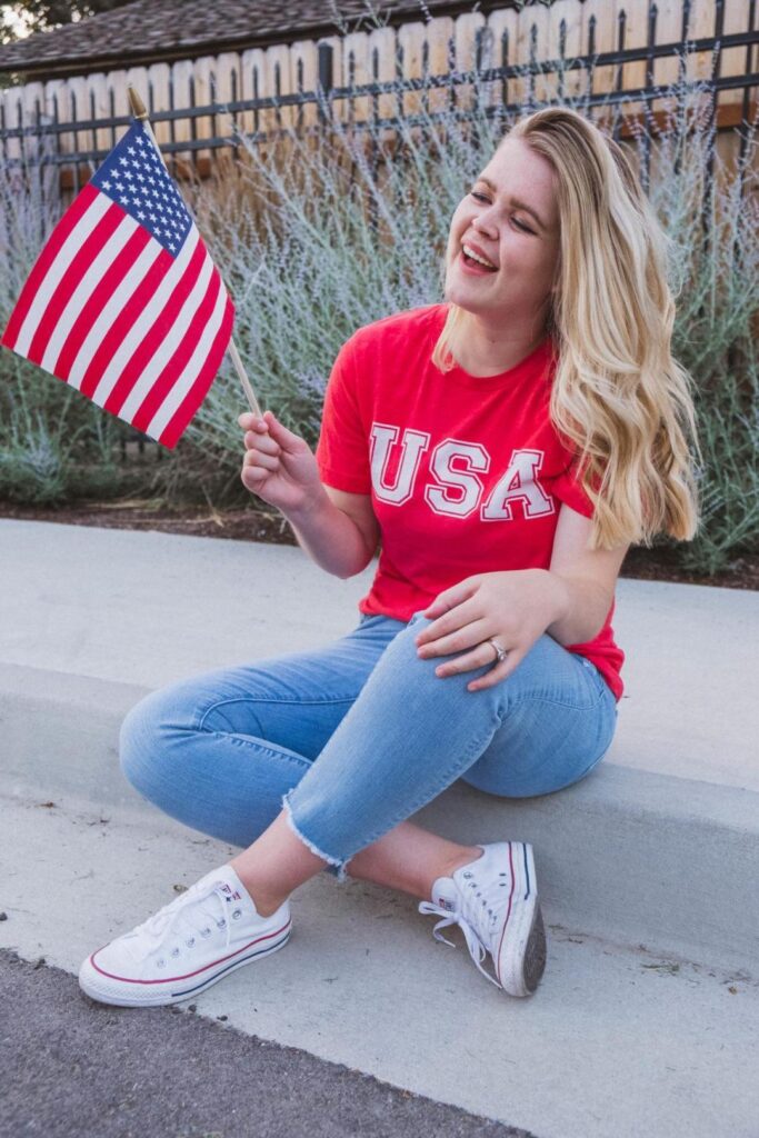 Kayla Smith wearing an outfit with red, white and blue.