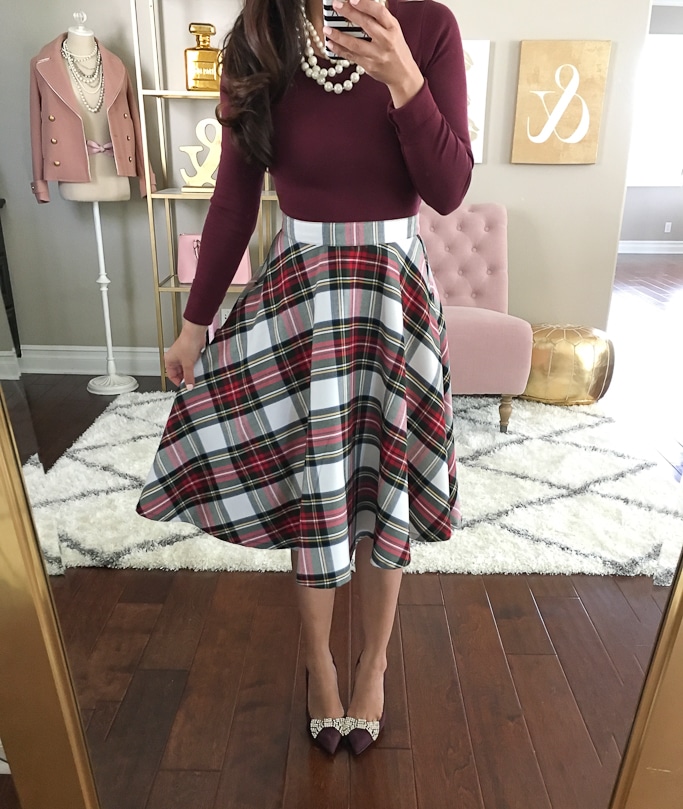 Stylish Petites's outfit with pumps, plaid skirt, and long sleeve top.