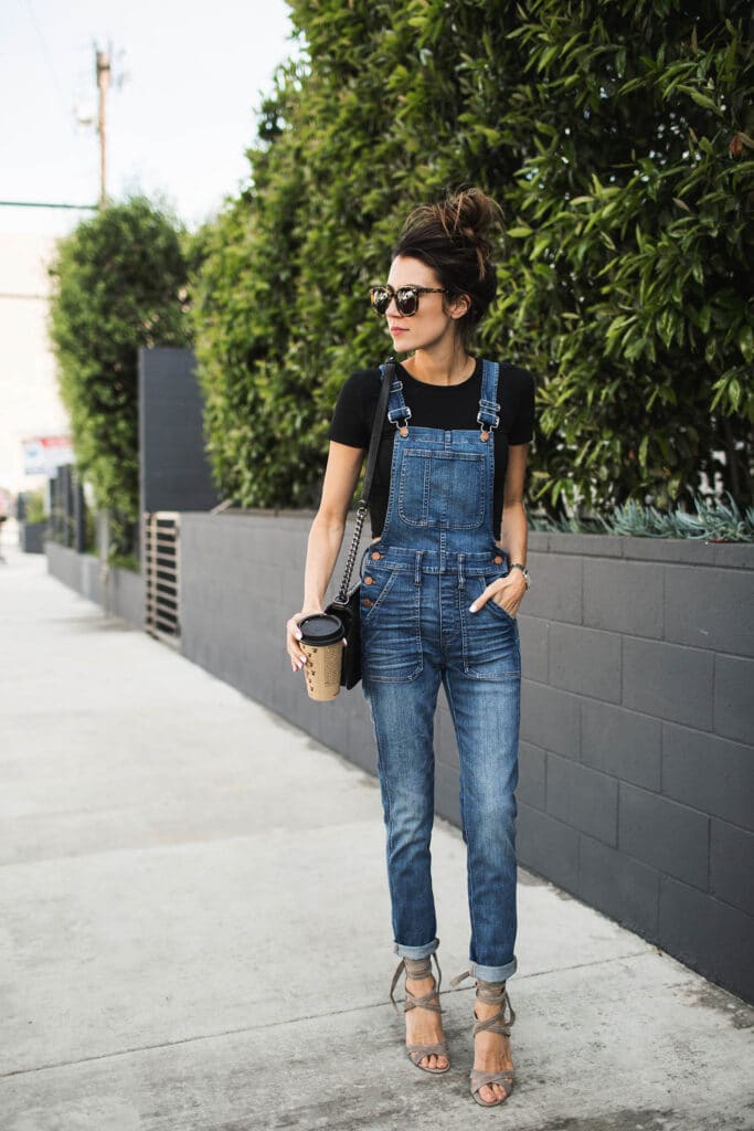 Christine Andrew from hellofashionblog.com styles overalls with heels