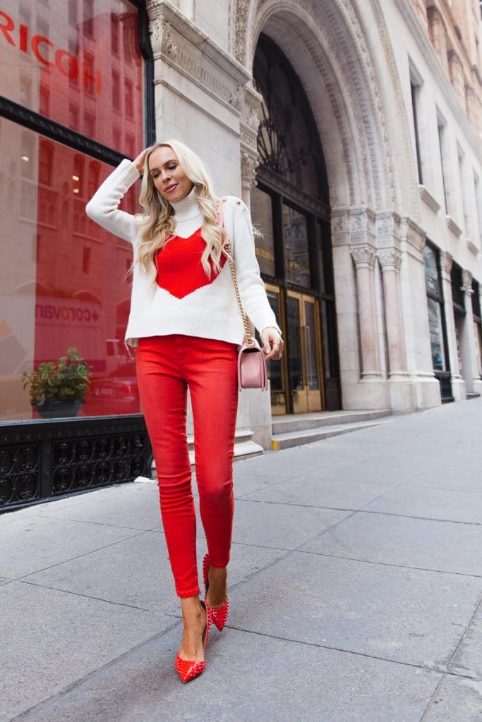 Veronica's Vday outfit featuring a heart sweater, red jeans, and red heels