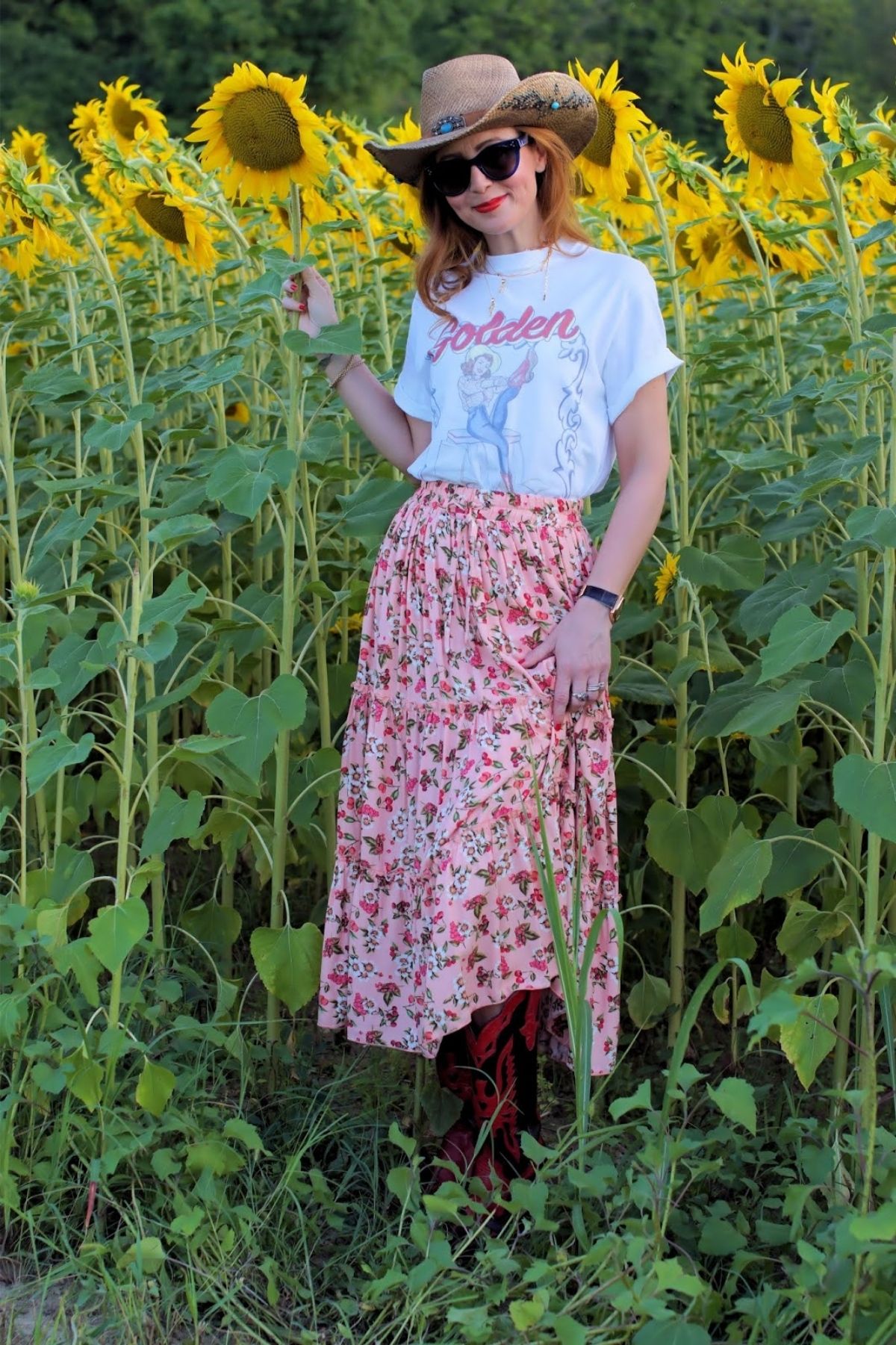 styling pint maxi skirt with short sleeve graphic tee that says golden goose on it