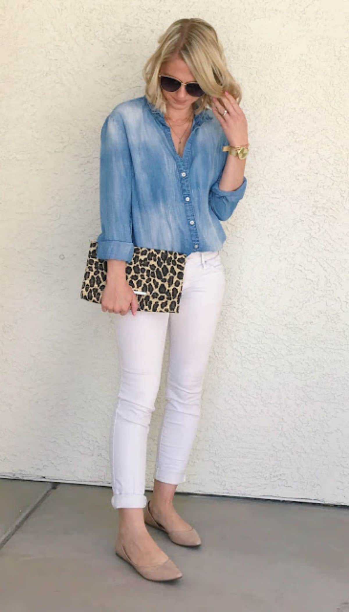 tucked chambray shirt into white jeans