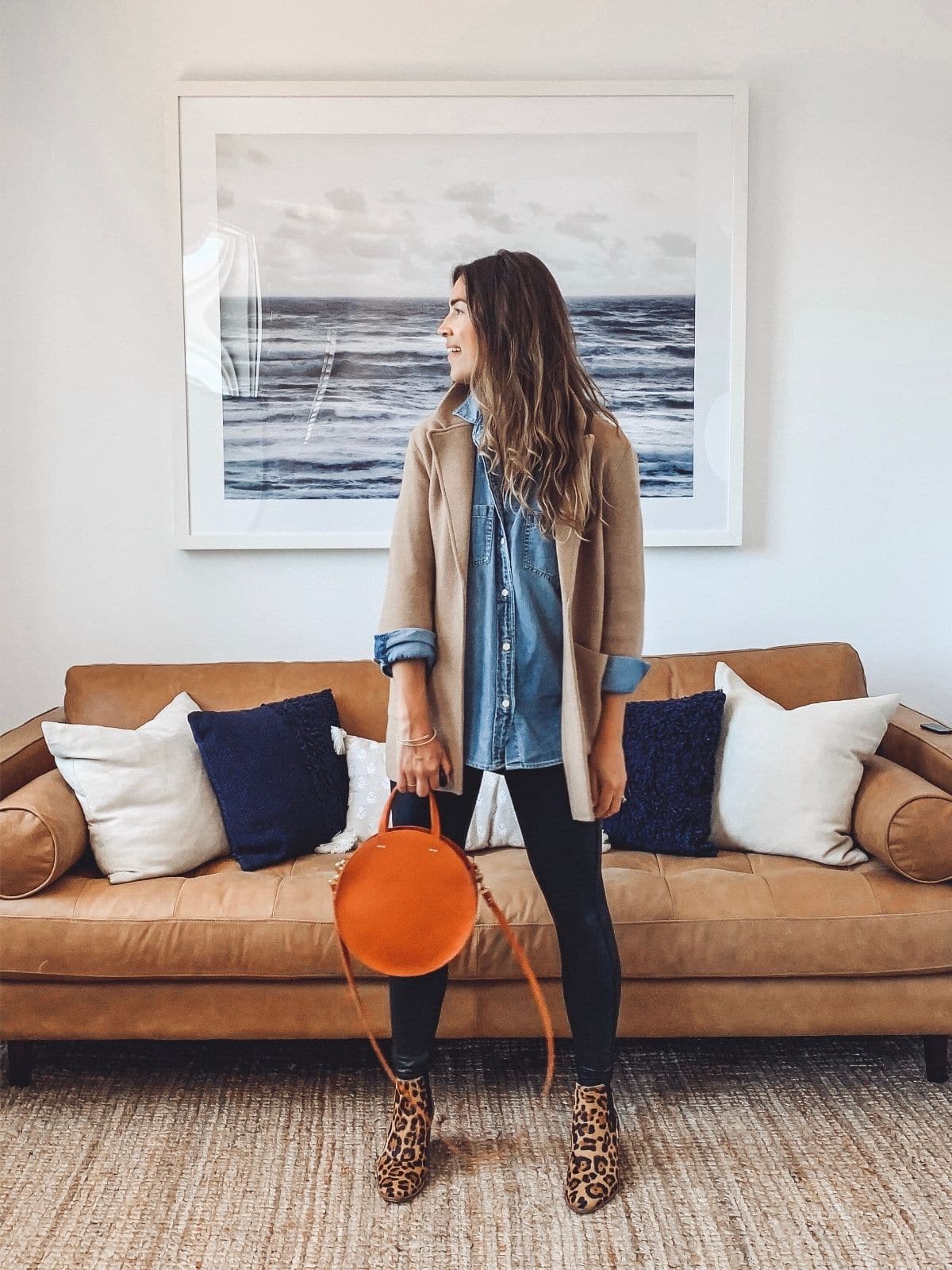 wearing chambray shirt with black leggings and cheetah print booties