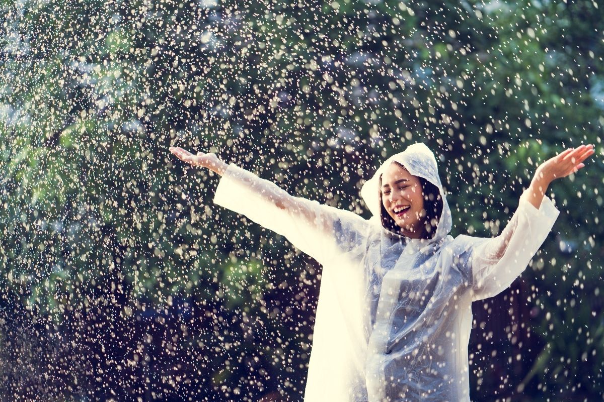 woman dressed in a poncho during the rain