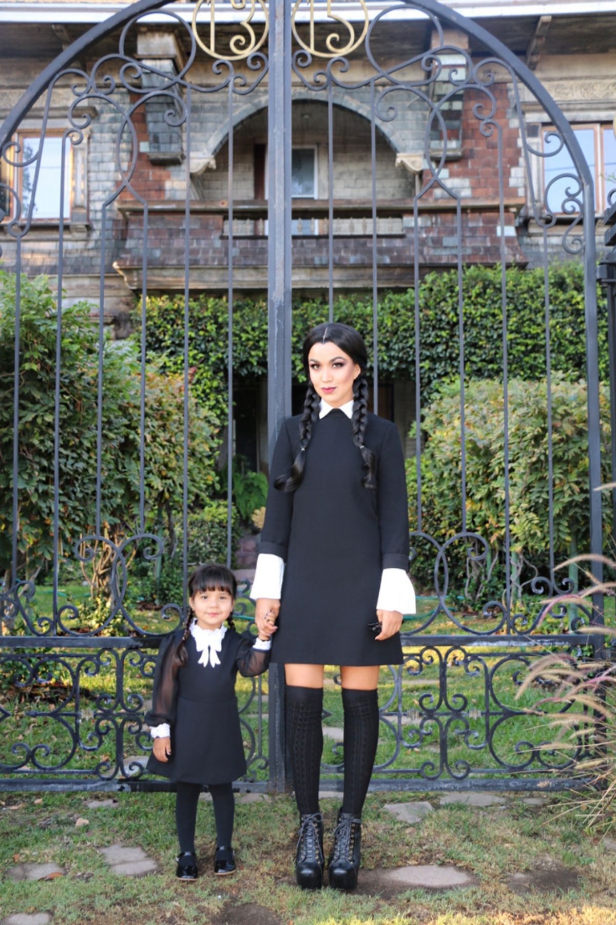 mom and daughter both dressed up as Wednesday Addams