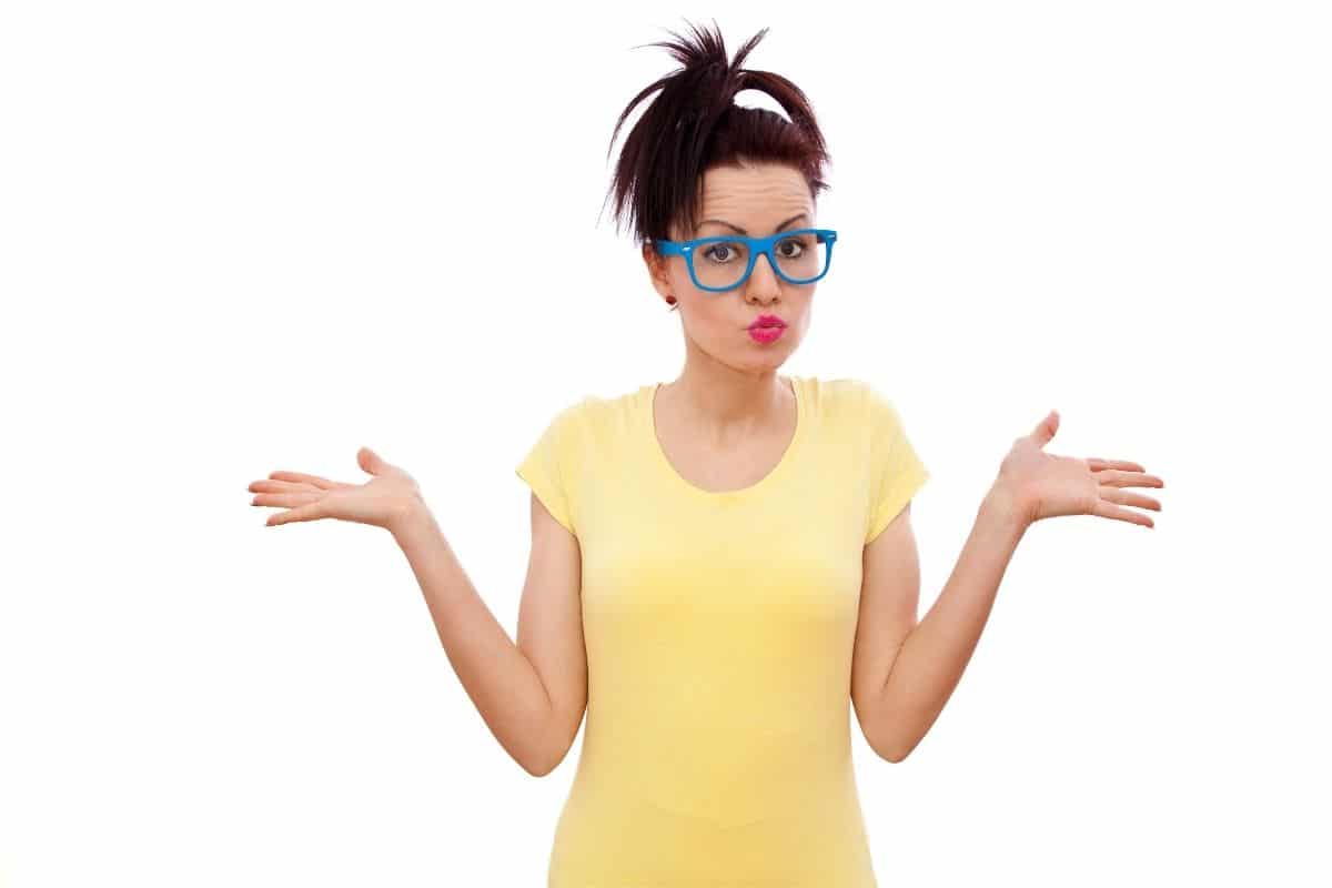 woman acting like she's faced with a dilemma