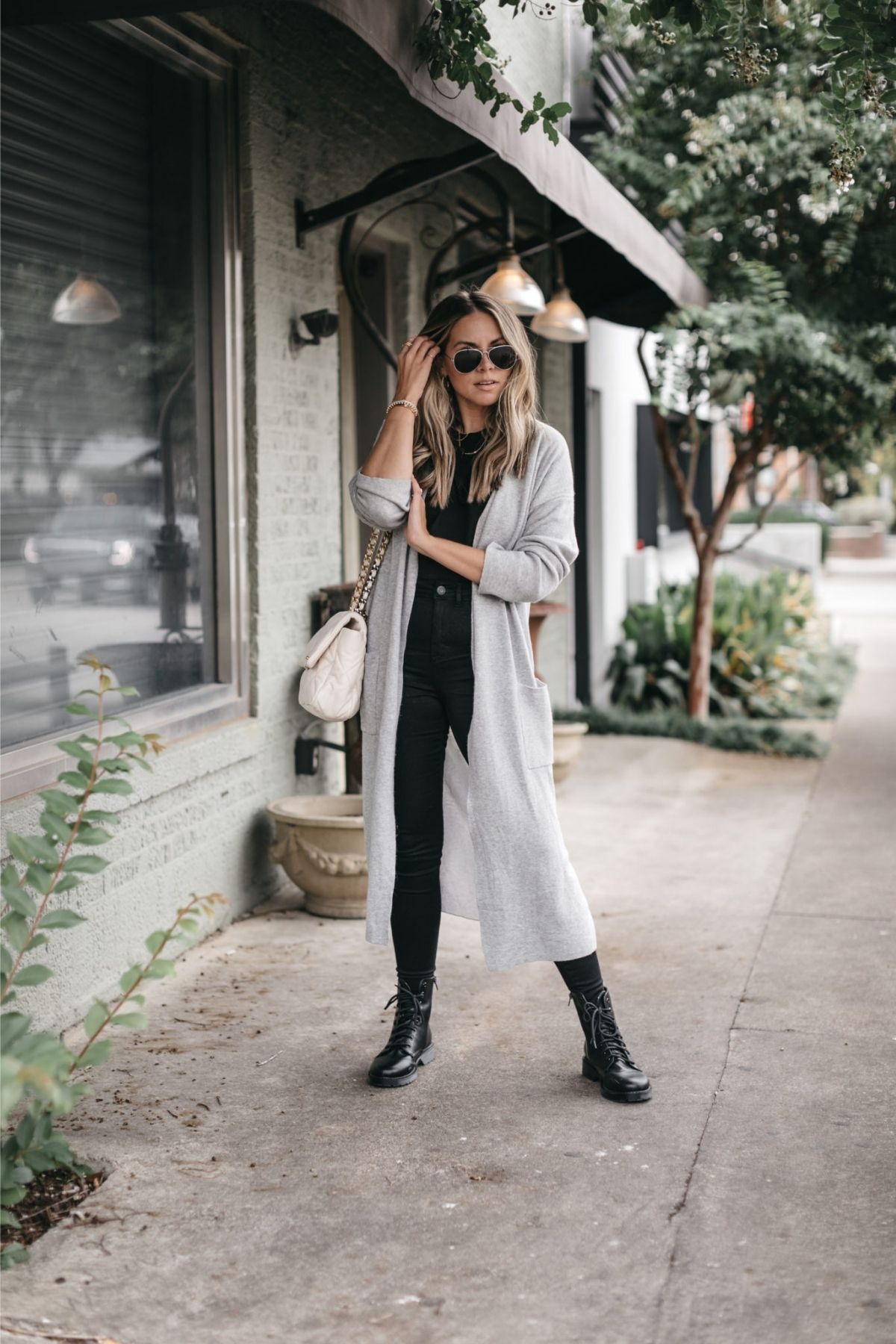 outfit with long cardigan and black pants