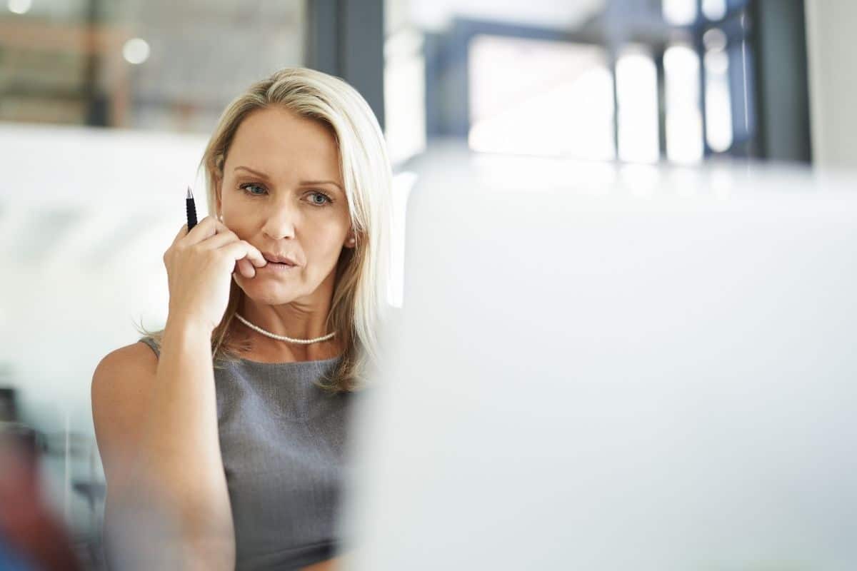 woman thinking to herself