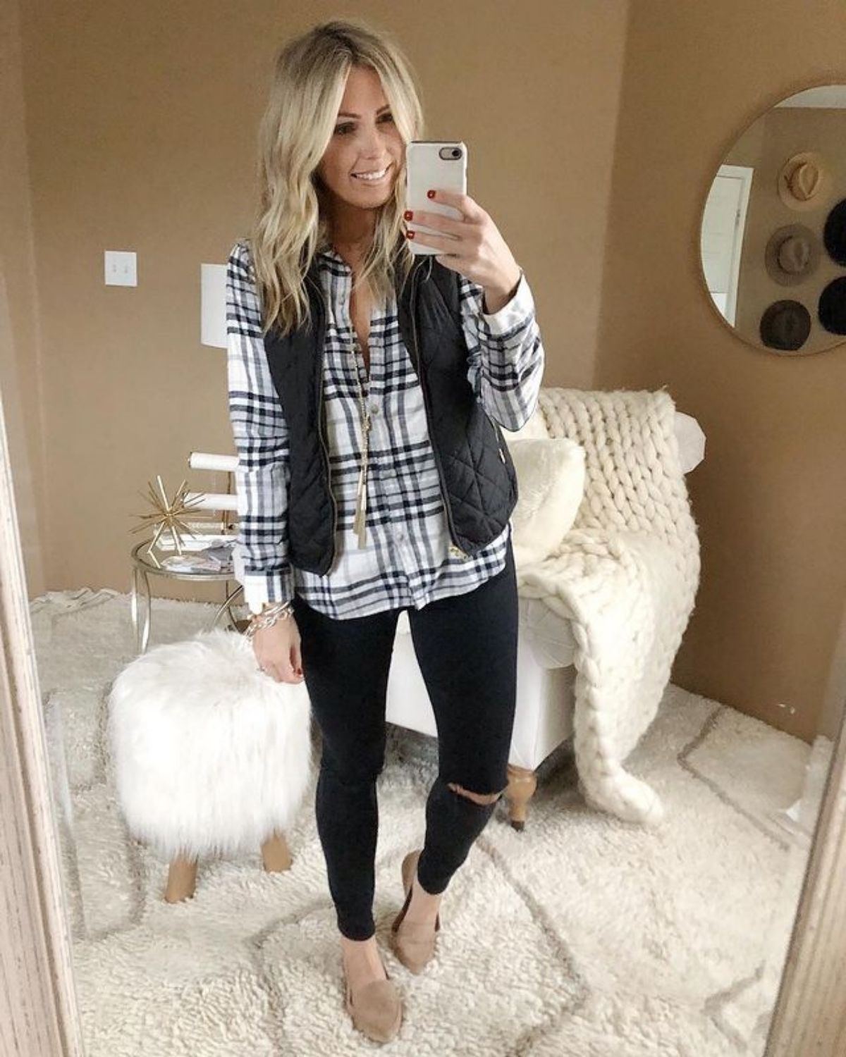 style black jeans with a vest