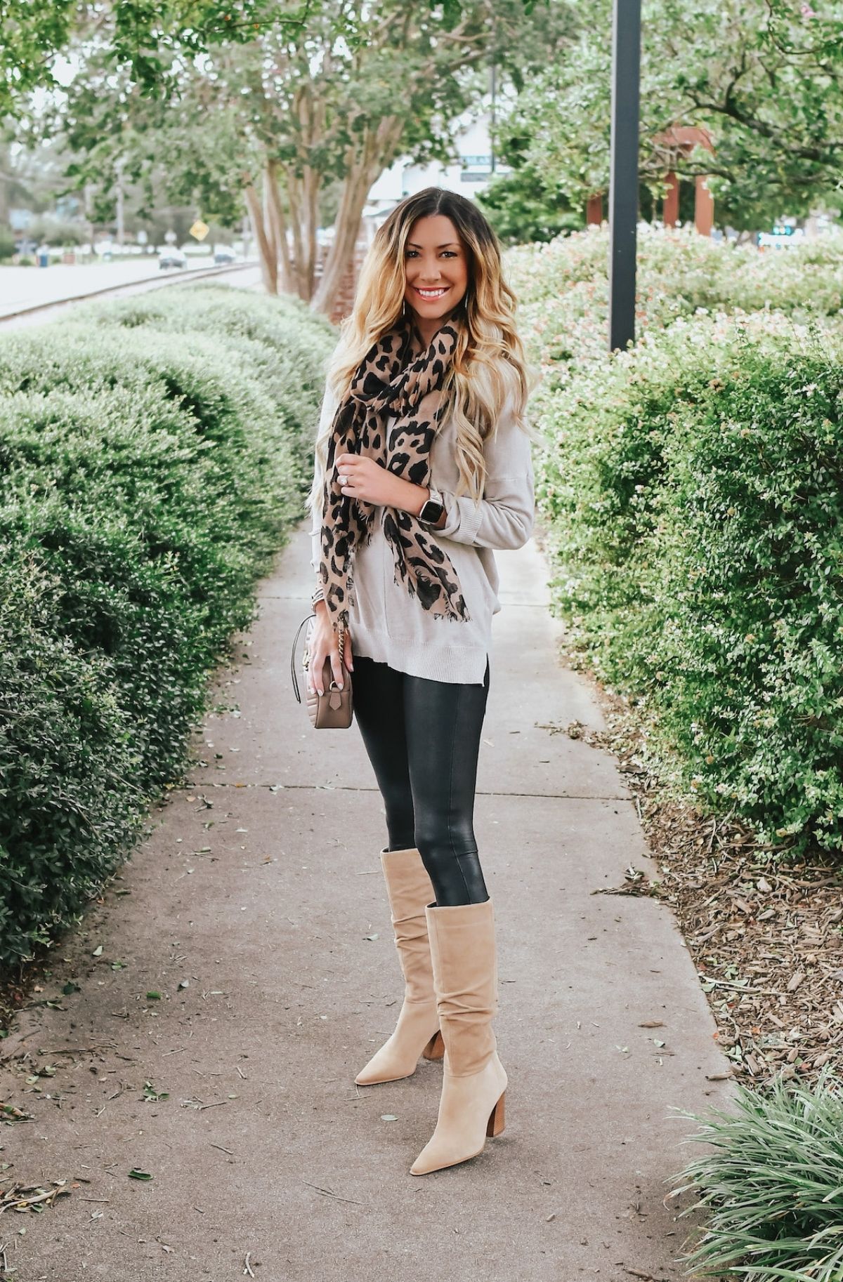 accessorize leather leggings with scarf