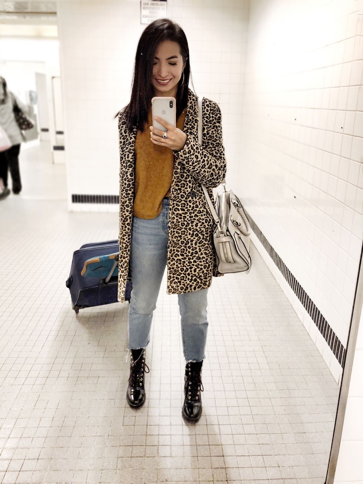 styling combat boots with oversized leopard jacket