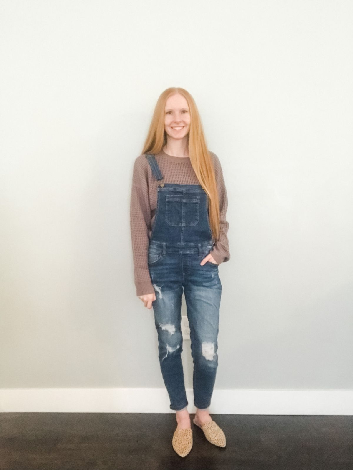 styling overalls with a sweater