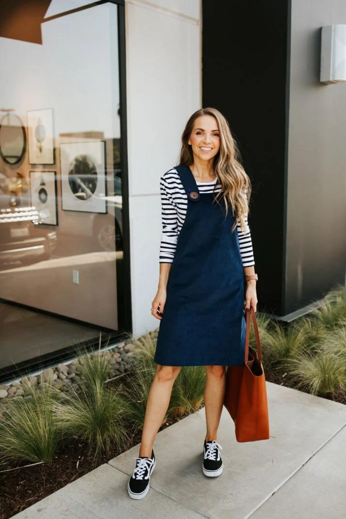 jumper dress outfit with striped shirt