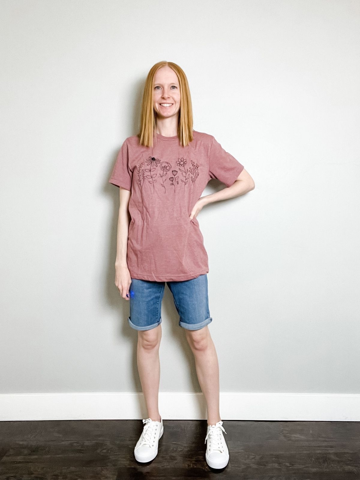 hot weather outfit with denim bermuda shorts and pink graphic tee