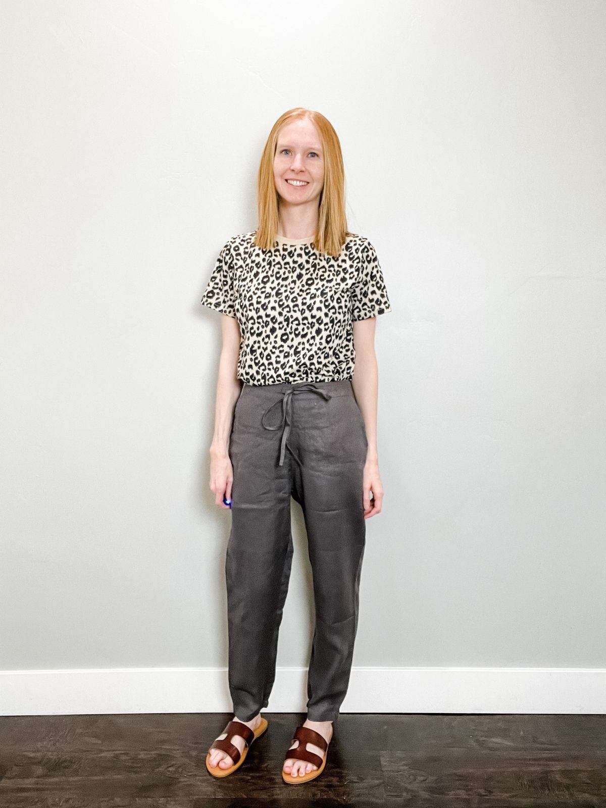 outfit with linen pants, gray linen pants, and brown sandals