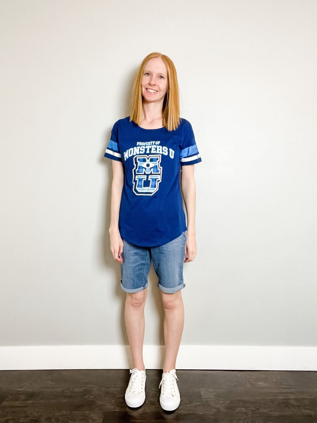 outfit with monster's university shirt, bermuda shorts, and white sneakers