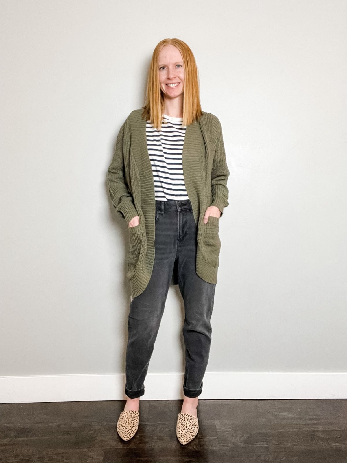 styling black jeans with striped shirt long green cardigan