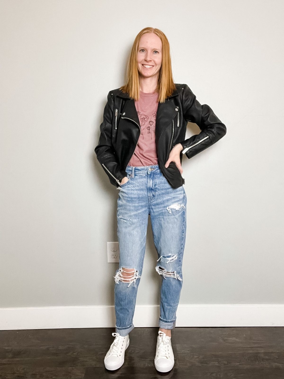 styling leather jacket with mom jeans graphic tee