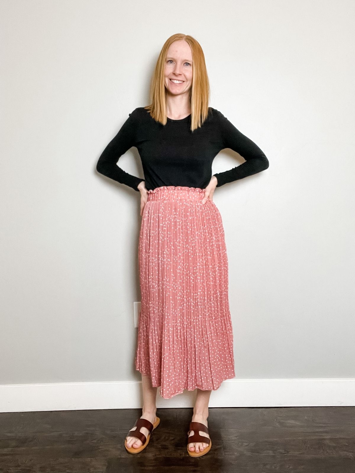 styling midi skirt with a black long sleeve shirt