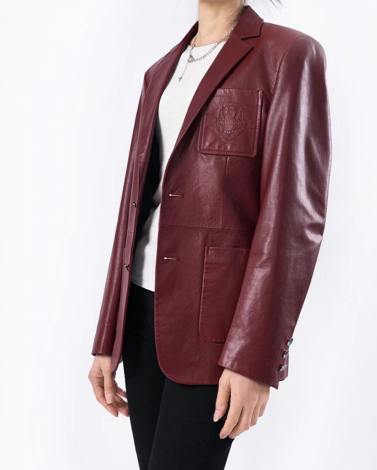 styling red leather blazer with white shirt and black pants