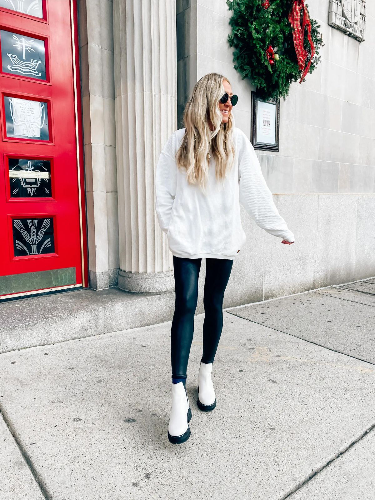 styling white chelsea boots with an oversized sweatshirt