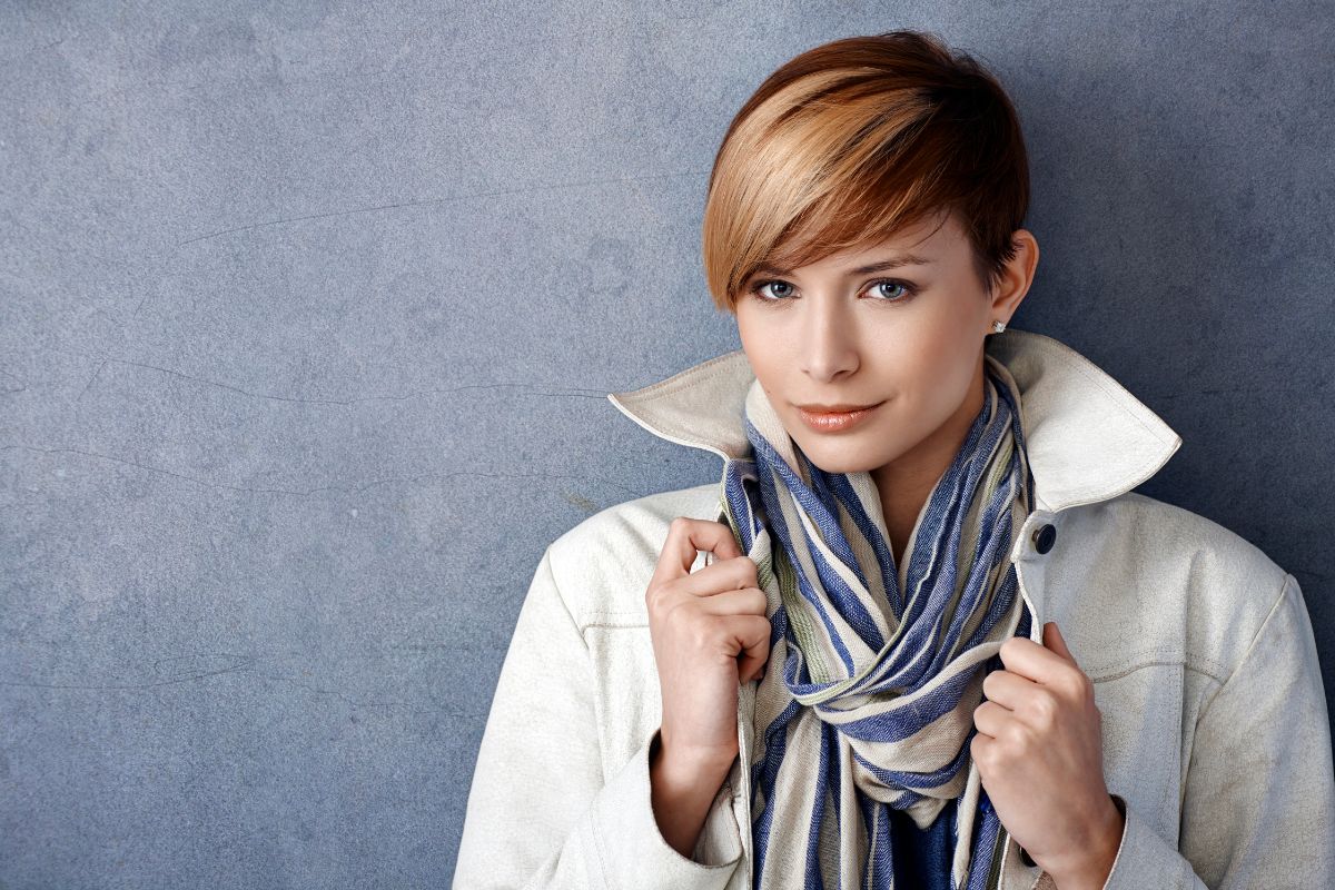 woman wearing a scarf and a jacket