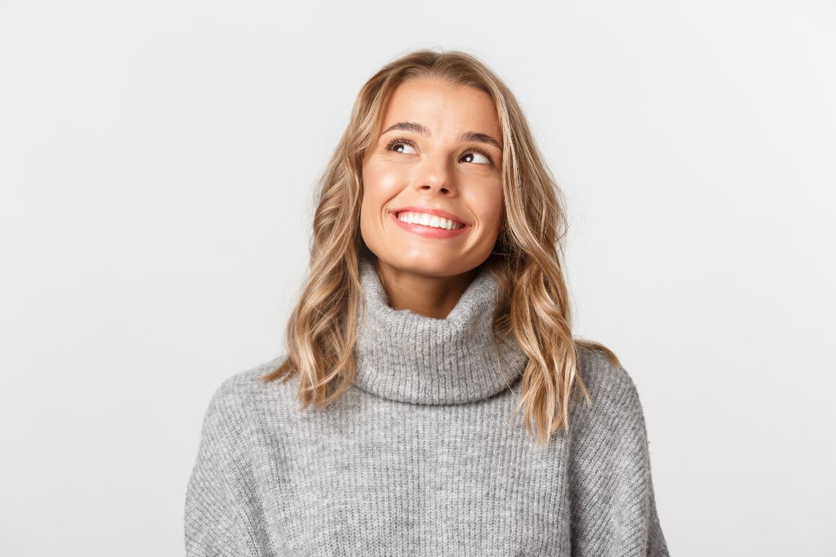 woman wearing turtleneck sweater