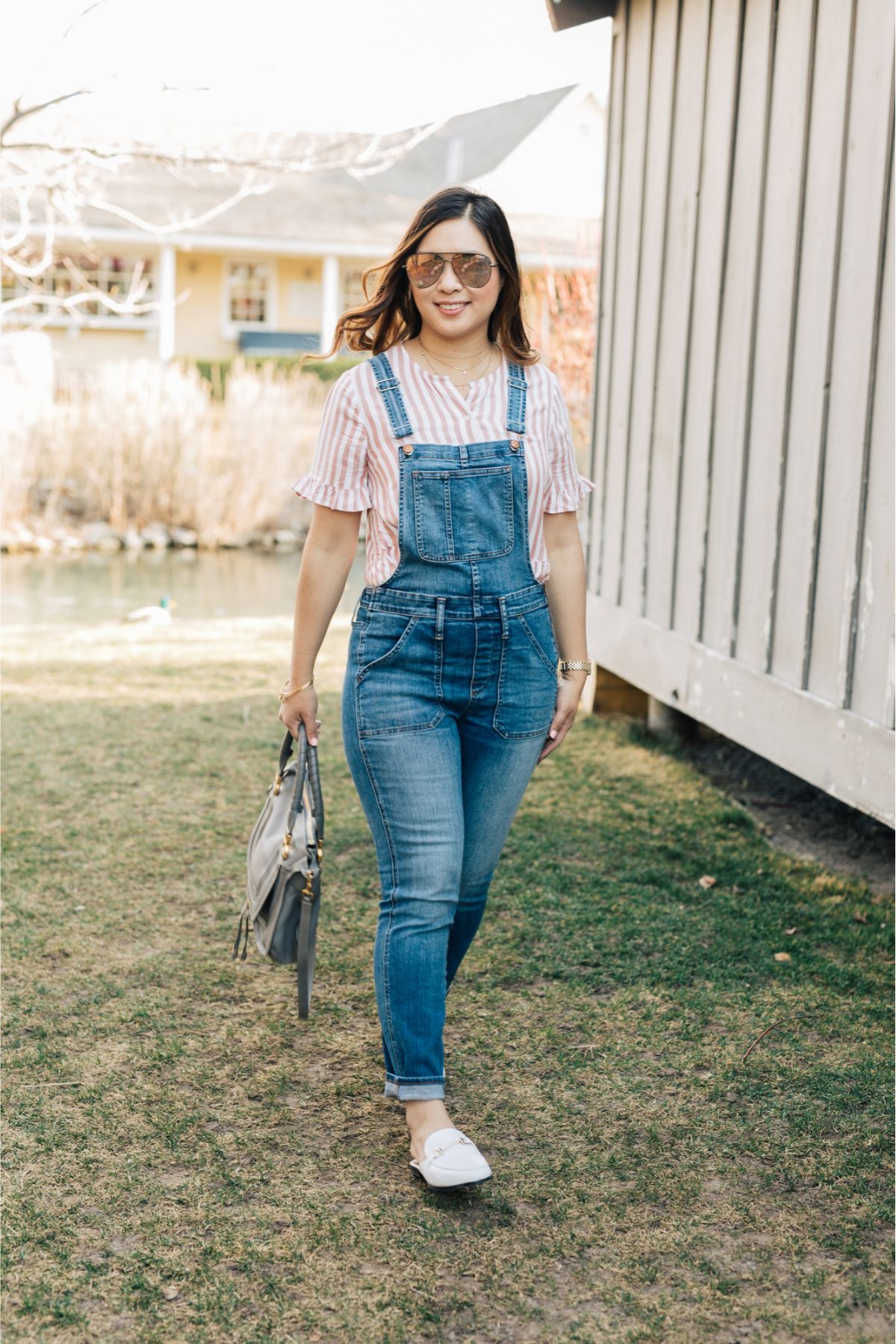 outfit with button down top, loafers, and overalls