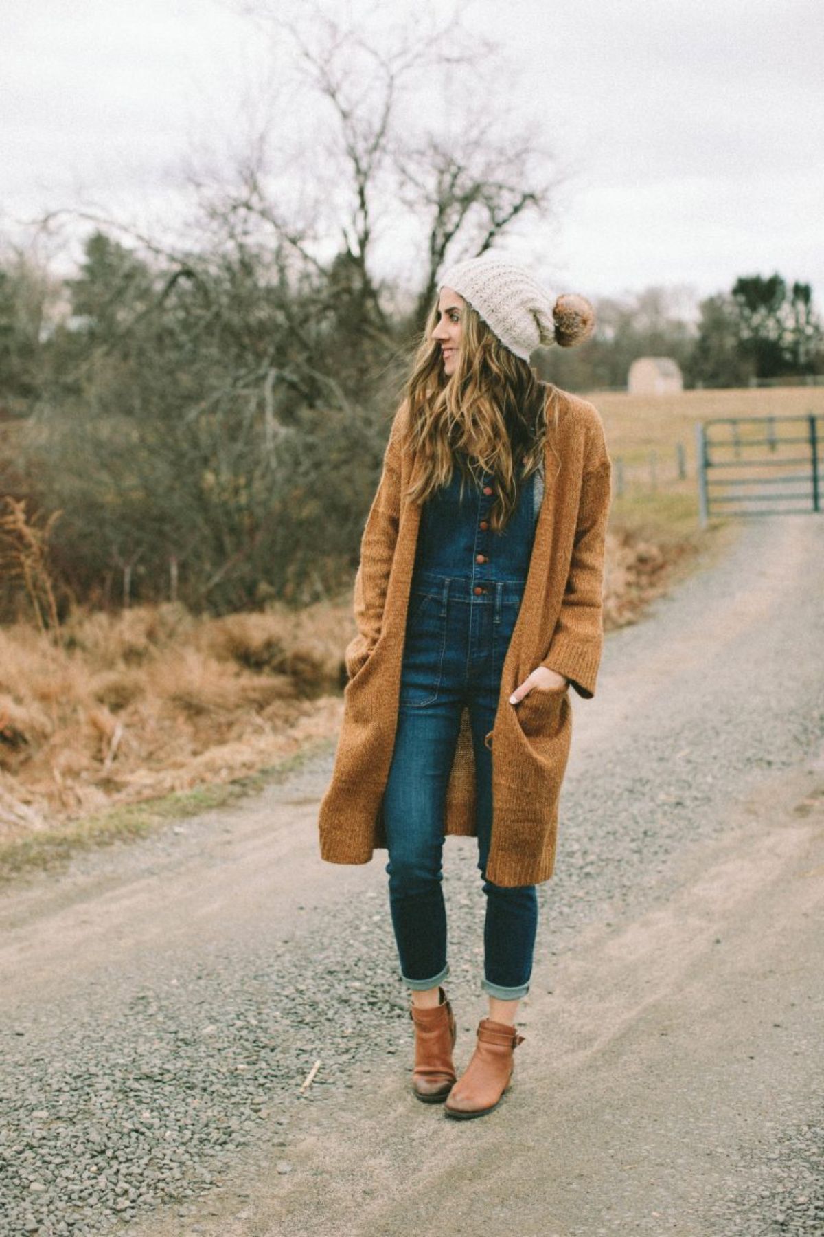 outfit that styles oversized cardigan and overalls