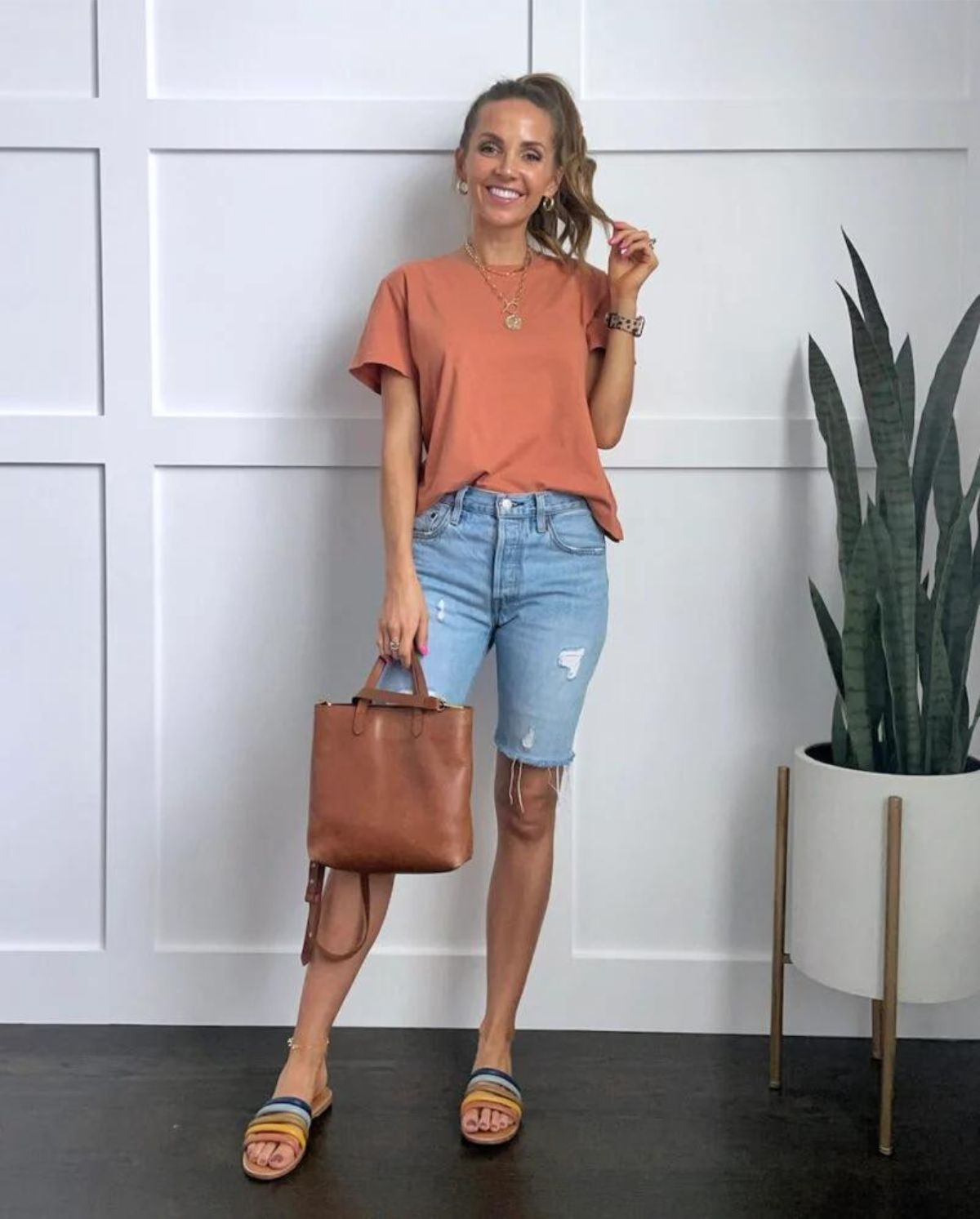 outfit with short sleeve shirt, sandals, and bermuda shorts