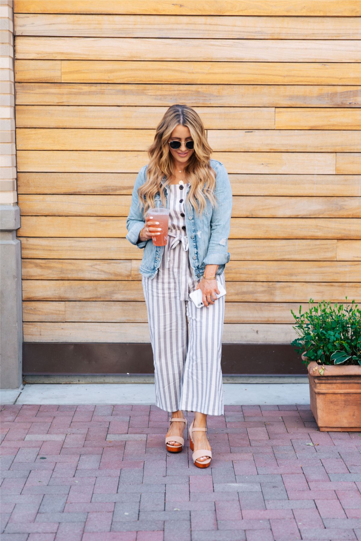 how to style a jean jacket with a jumpsuit