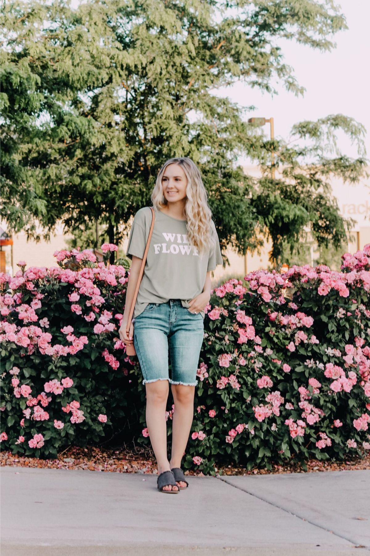 styling bermuda shorts with a graphic tee