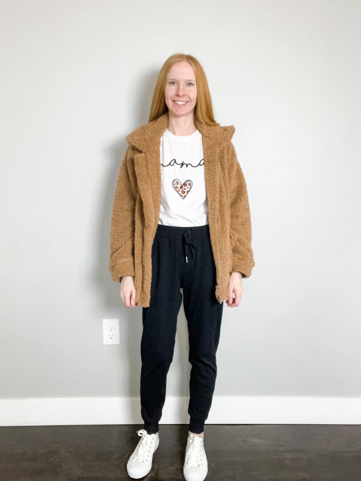 sherpa jacket outfit with graphic tee and joggers