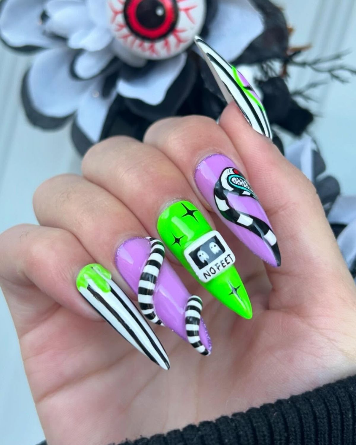 Pointy Beetlejuice Nails