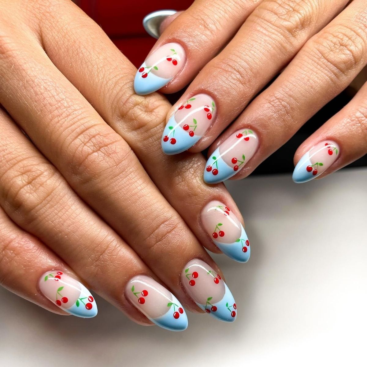 Blue Tips and Cherries Nails