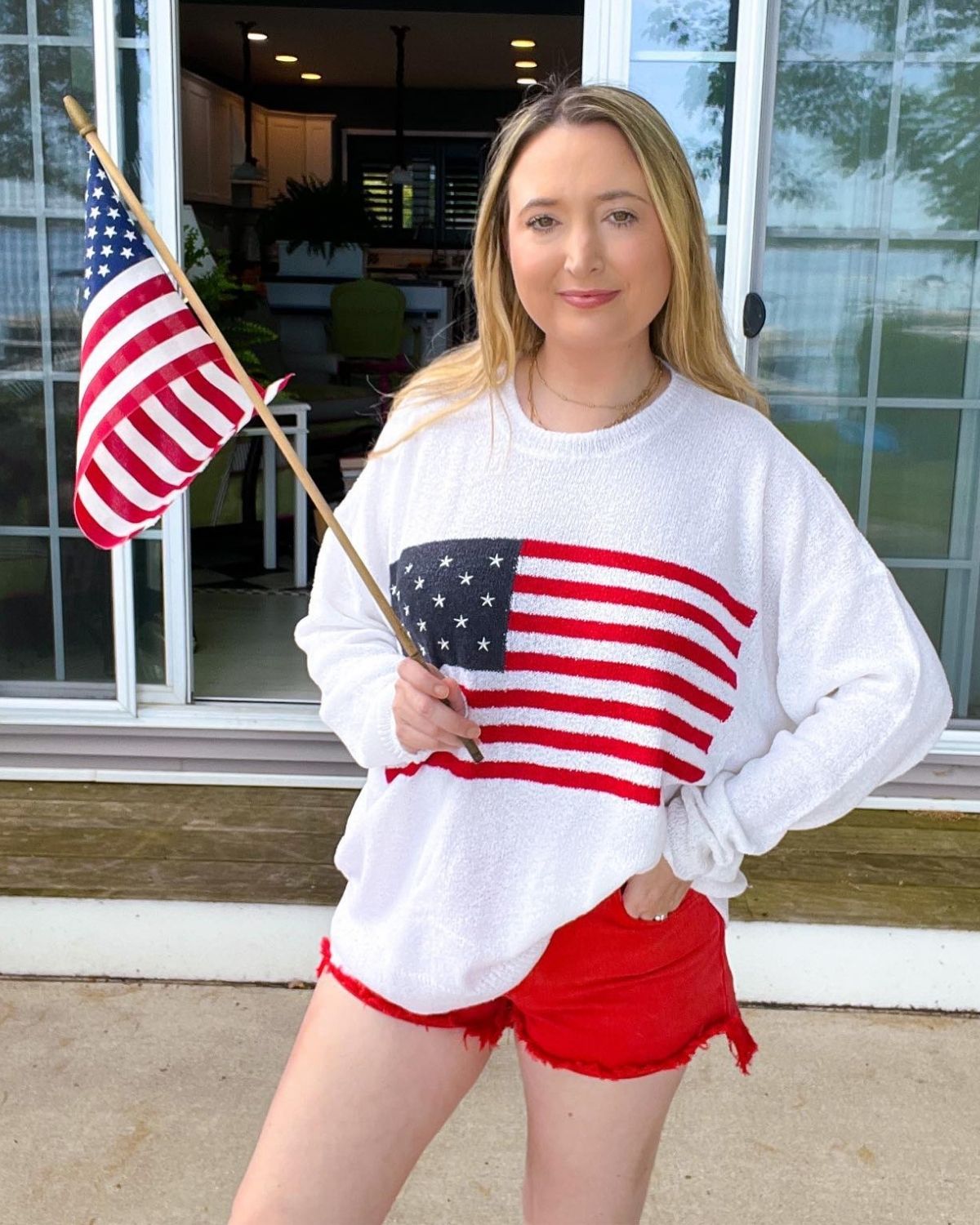 Flag Sweater With Red Shorts Outfit